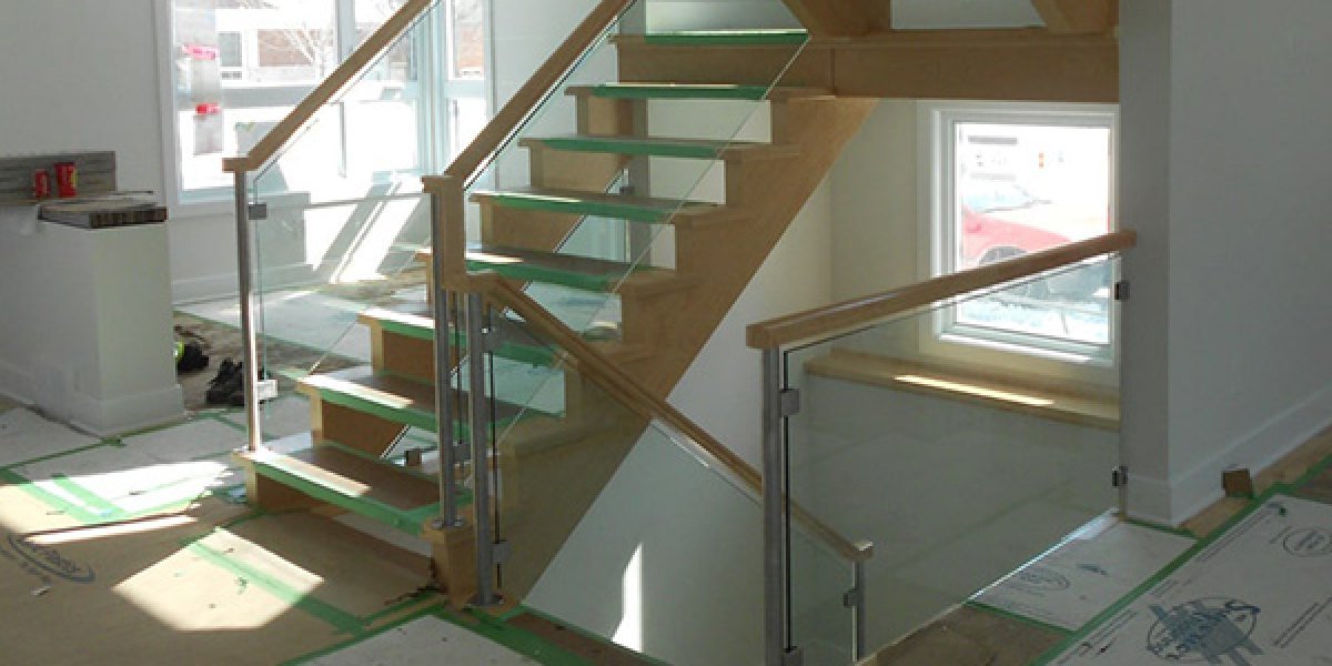 Glass deck railing with lake view